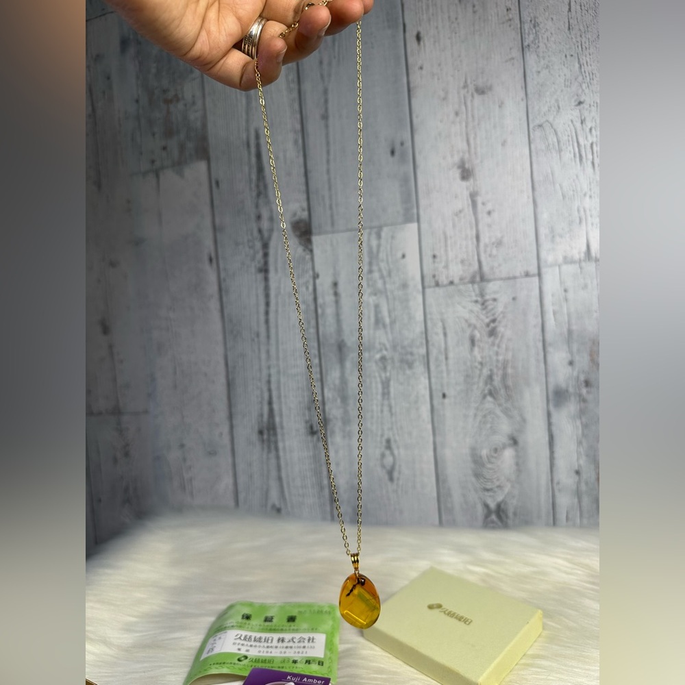 AMBER necklace in 18k gold and plated chain - Picture 6 of 17